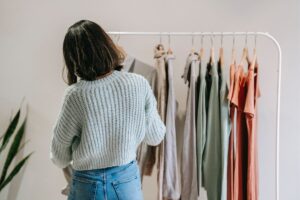 Woman shopping in a sustainable clothing brand